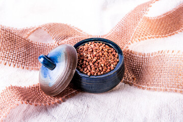 Bowl with raw uncooked buckwheat, Raw Buckwheat Pile, Dry Buck Wheat Grains, Uncooked Buckwheat