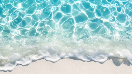 Tranquil ocean water gently laps onto a sandy shore, the clarity of the water creating a mesmerizing pattern of sunlit ripples - obrazy, fototapety, plakaty