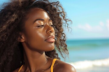 Handsome african american woman posing on the beach. Summer time