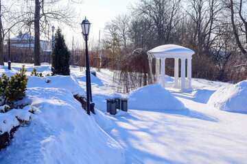 gazebo on the observation deck in a snow-covered park