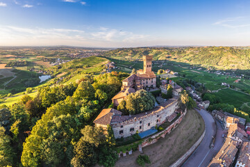 Aerial view of Cigognola Castle with his vineyard in background, Oltrepo Pavese, Pavia, Lombardy, Italy - obrazy, fototapety, plakaty