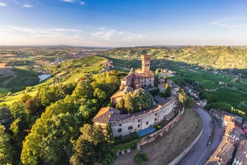 Foto op Plexiglas Aerial view of Cigognola Castle with his vineyard in background, Oltrepo Pavese, Pavia, Lombardy, Italy © EyesTravelling