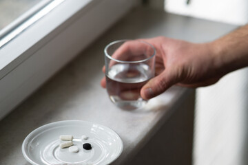 Pill box with variety of pills and supplement, pill organizer
