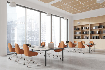 Modern office coworking interior with work desk and shelf, panoramic window