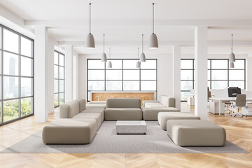 Stylish office interior with coworking and chill zone, panoramic window