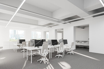 Workplace in white coworking office