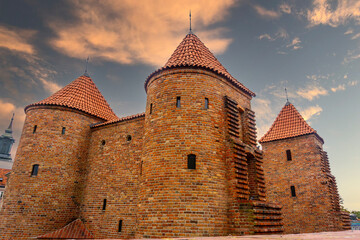 Fototapeta premium Old fortified Castle Barbican located in the center of Warsaw, Poland, October, 2023.