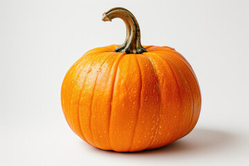 Obraz premium Vibrant Orange Pumpkin Isolated on a White Background Signaling Autumn Harvest A ripe, brightly colored orange pumpkin sits center stage against a clean white backdrop.