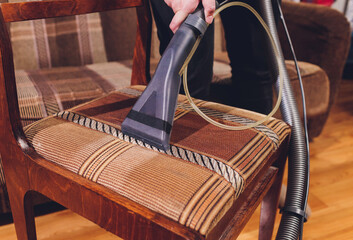 Chairs chemical cleaning with professionally extraction method. Upholstered furniture. Early spring cleaning or regular clean up.