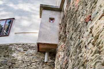 Toilette on a wall of ancient castle in Austria. Schlaining castle.
