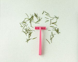 pink razor with needle needles, concept of shaving, hair removal