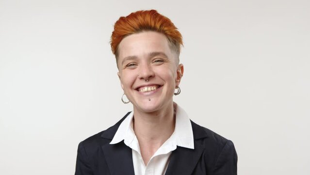 Energetic lesbian businesswoman radiating confidence and happiness, dressed in a professional suit, showcasing her unique style with pride. Camera 8K RAW.