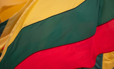 The national flag of Lithuania flutters in the wind