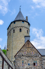 Fototapeta na wymiar Old tower and rooftops, Altena, Germany 