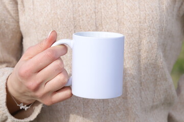 person with cup of coffee