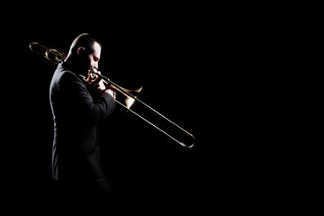 Trombone player. Trombonist playing jazz music - 732782375