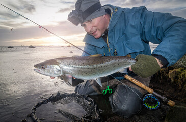 Winter sea trout fishing at the sunrise - 732791557