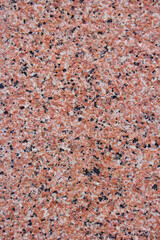 Granite texture with red, black and white colors.