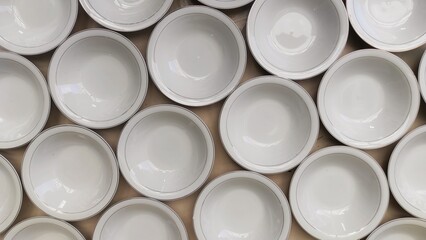 White clean empty plate on the table before filled food