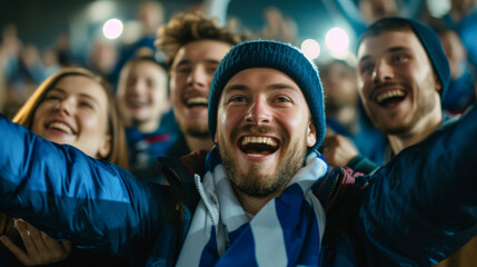 Scottish football soccer fans in a stadium supporting the national team, Bravehearts