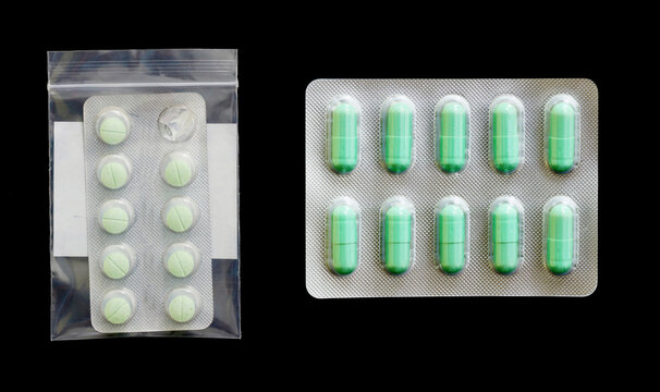 Medicine pills on a black background