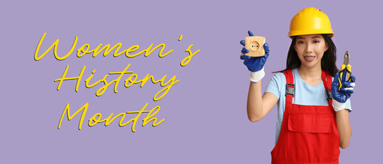 Young female electrician with pliers and socket on purple background