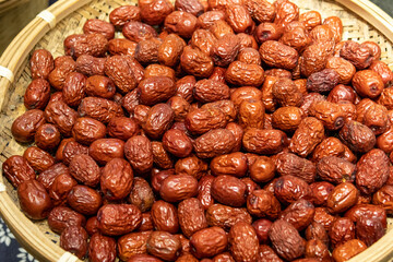 Dried red date on a basket