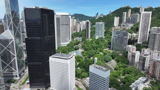 Hong Kong Park and Hong Kong Zoological and Botanical Gardens near Admiralty Central, is a large urban oasis in the bustling HK Island premium commercial and residential concrete forest,Drone Aerial 