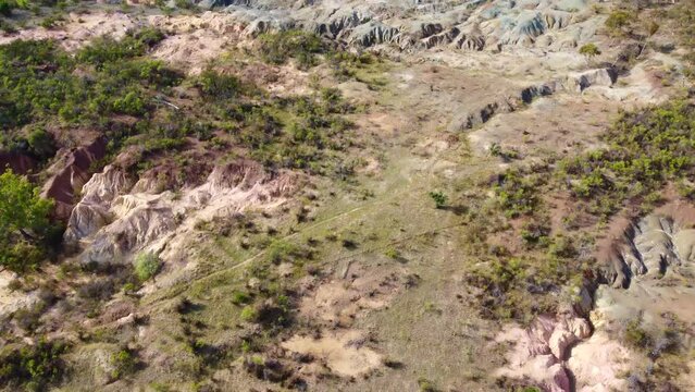 Footage Aerial view of Pink Cliffs Geological Reserve mining activity in the late 19th century the dramatic, colourful cliffs, Heathcote, Victoria, Australia.