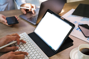 Mockup of a man holds tablet computer with isolated screen  digital tablet with blank screen Mockup replaces your design mockup in the office.