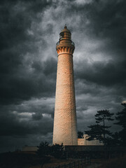Epic Elevation: Japanese Lighthouse Embracing the Drama Above