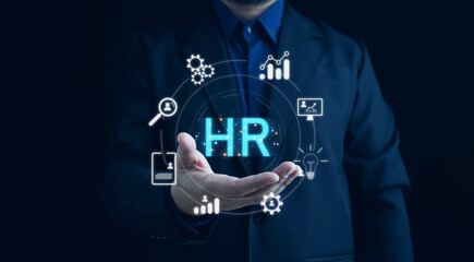 HR management, Human resources management concept, Technology and network concept. CRM, HR word button. Businessman presses hr icon on virtual screen on background of network business success sign.