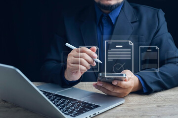 E-signing, electronic signature, document management, paperless office. Businessman signing on e document on digital tablet, virtual notepad on virtual screen, Online contract signing with application
