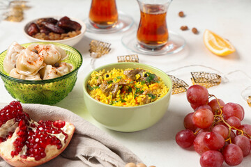 Traditional Eastern dishes on white table. Ramadan celebration