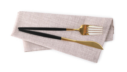 Grey napkin with golden fork and knife isolated on white, top view. Cutlery set