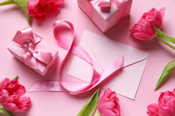 Composition with figure 8 made of ribbon, flowers and gift boxes on pink background. International Women's Day celebration