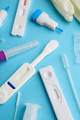 Disposable express test kits on light blue background