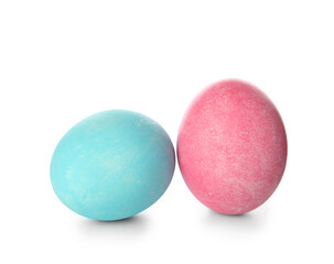 Pink and blue Easter eggs on white background