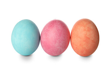 Three painted Easter eggs on white background