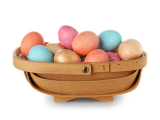 Basket with Easter eggs on white background