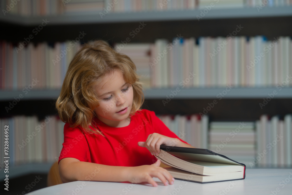 Poster Education Concept. Schoolboy reading book in library. Kids learn to read. Pupil reading books in a school library. School child doing homework, study hard in classroom.