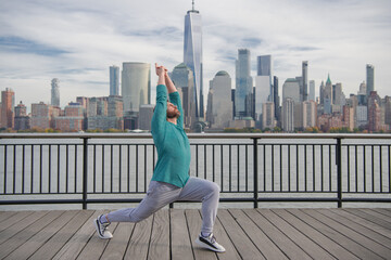 Athletic mature man workout outdoor. Fit millennial Hispanic man in sportswear exercise outdoor. Healthy lifestyle in NYC. Senior man exercise, workout or jogging. Active and sporty man in sportswear