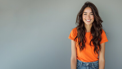 Hispanic woman wear orange casual t-shirt smile isolated