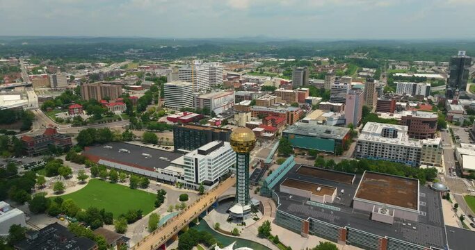 Knoxville Tennessee urban architecture in city downtown. Panoramic view of Sunsphere in World's Fair Park and business district skyline with high-rise buildings