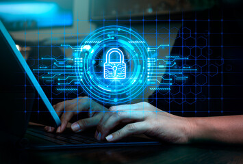 Cybersecurity, worldwide internet network security technology, privacy digital data protection concepts. Blue safety digital lock icon showing on virtual screen while person work with tablet computer.
