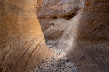 Bizarre natural patterns on mountain walls on tourist route of gorge Wadi Al Ghuwayr or An Nakhil...