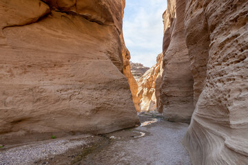 A never drying stream at beginning of tourist route of the gorge Wadi Al Ghuwayr or An Nakhil and...