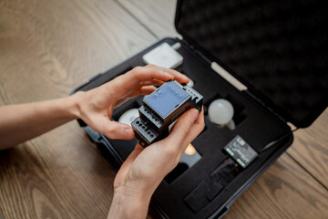 A technician works with a demo kit of the smart home system