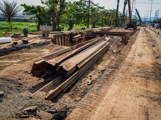 Big road construction site with special machinery in the construction area