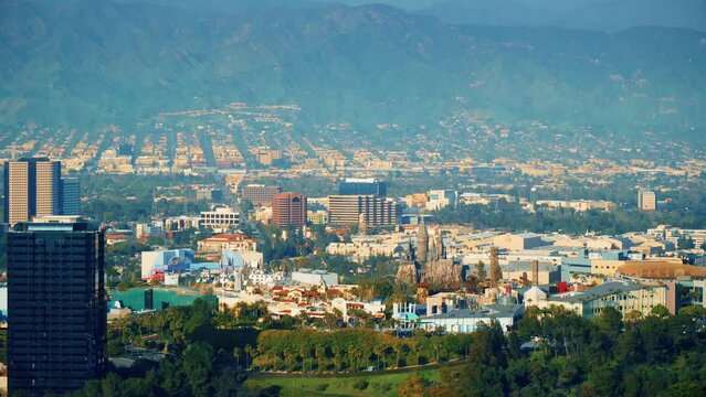 Studio City, California, United States &ndash; April 16, 2019: Universal Citywalk overlook. Hogwarts Cattle. Universal City Theme Park aerial view. Breathtaking look on city from the hills in slow motion.